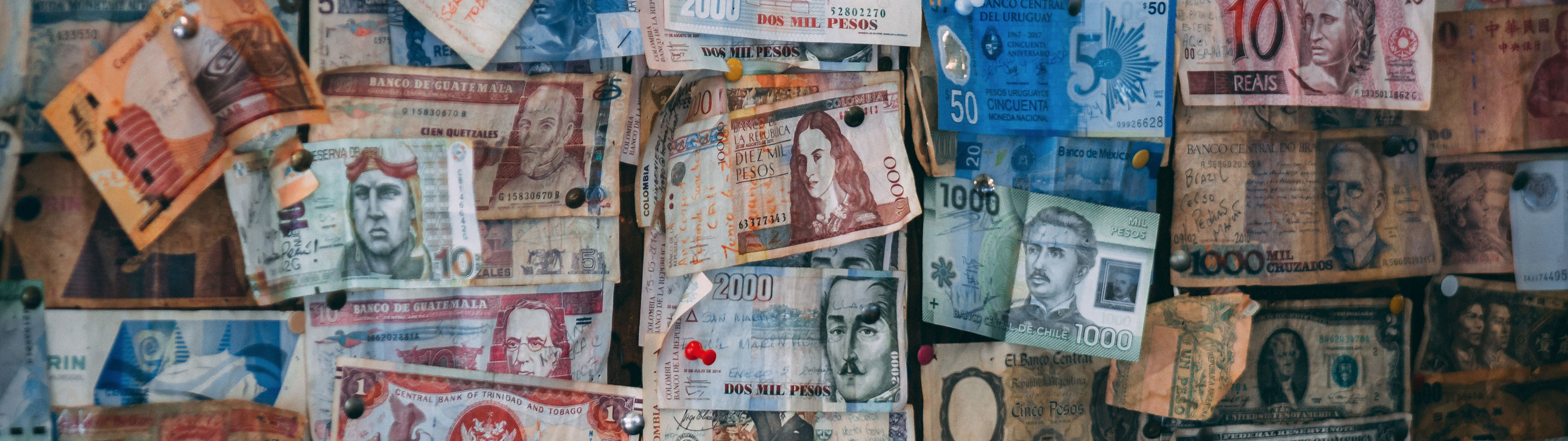 Premium Photo | A stack of currency notes with the number 200 on them.